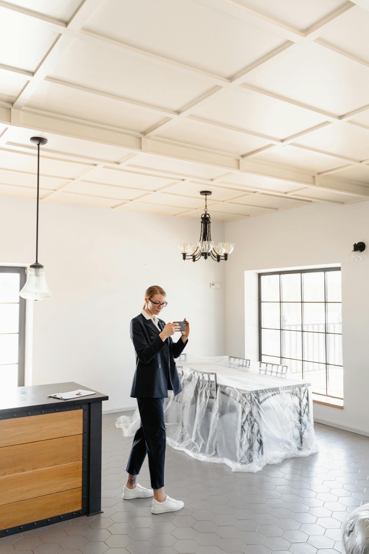 owner or property manager taking a photo of construction progress